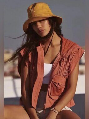 FP Movement from Free People Pleaty Please vest in Red Rocks/Orange